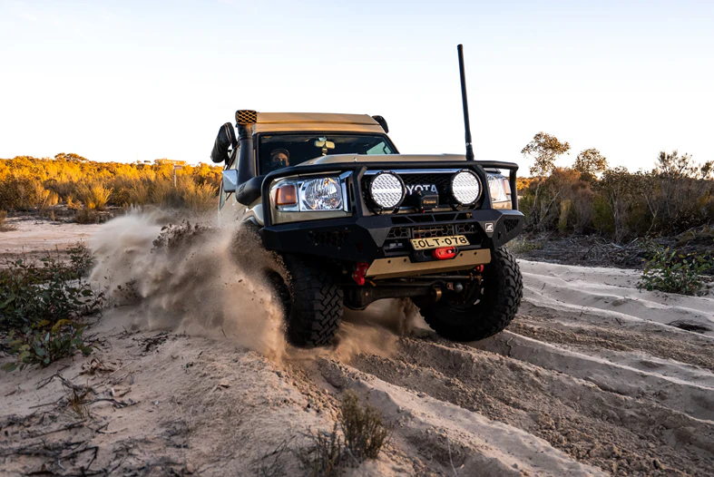 4WD driving on soft sand after airing down tyres